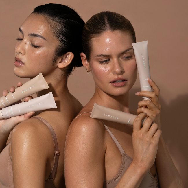 Models holding Airyday SPF tubes